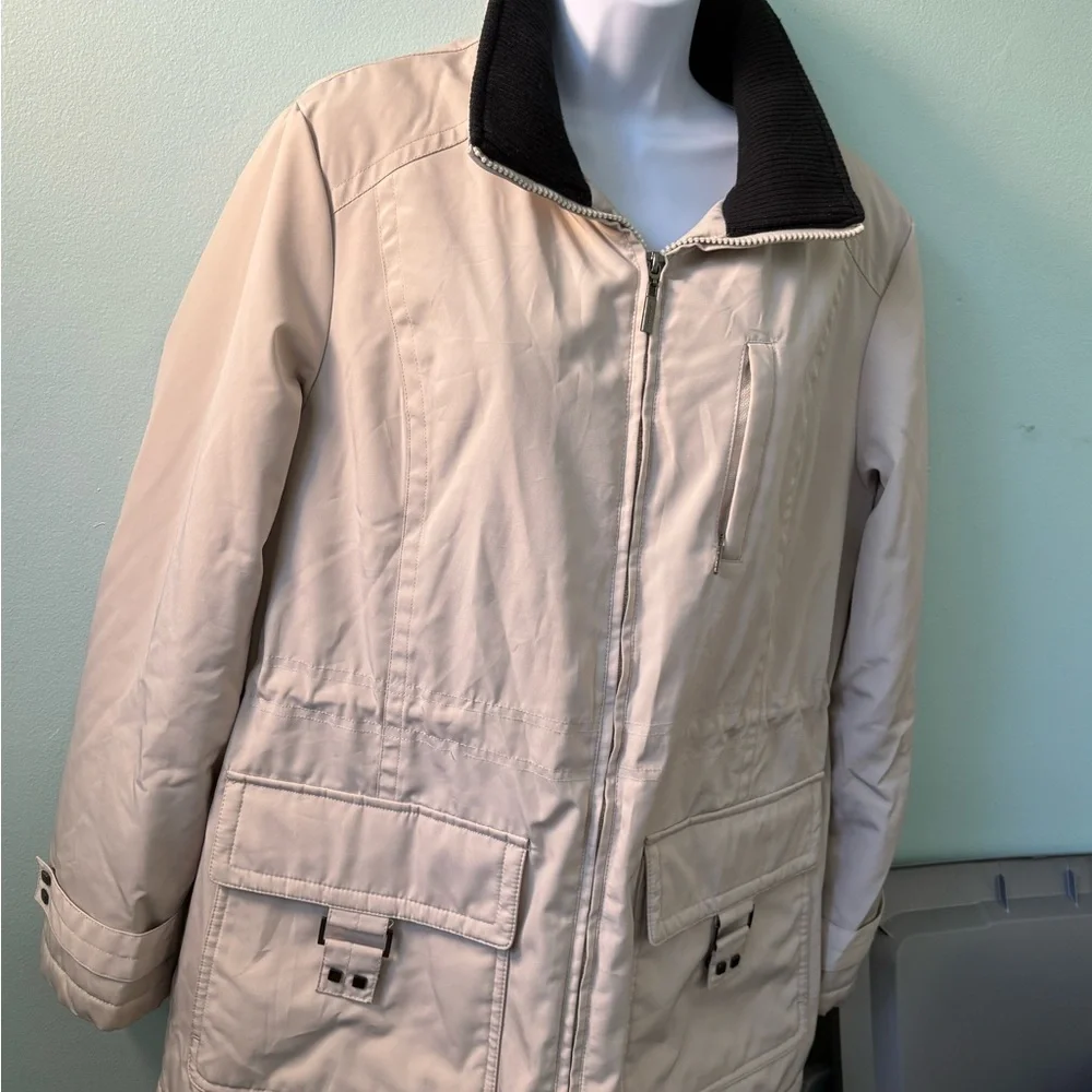 The London Fog women's trench coat in beige with a corduroy brown collar is a cl